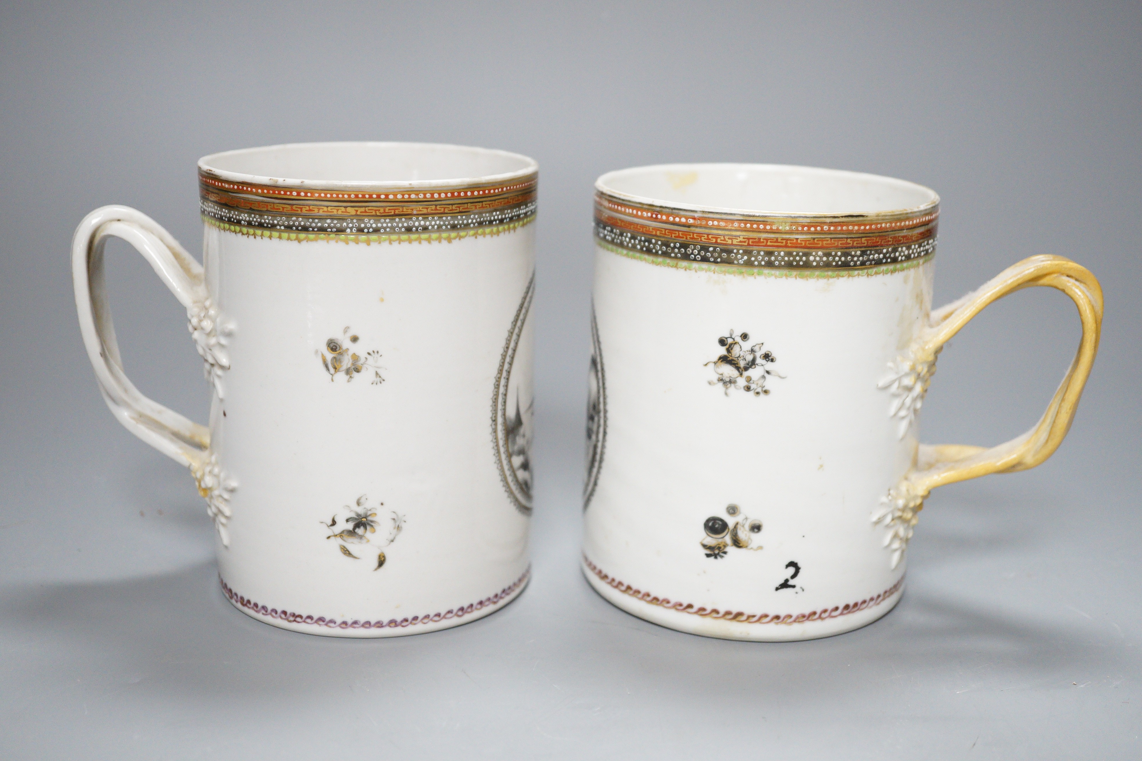 A pair of 18th century Chinese export cylindrical mugs, 13cm